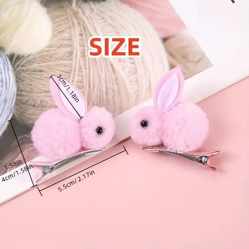 4 Small Easter Bunny Gifts And Accessories, Including Headbands And Hair Clips in White.